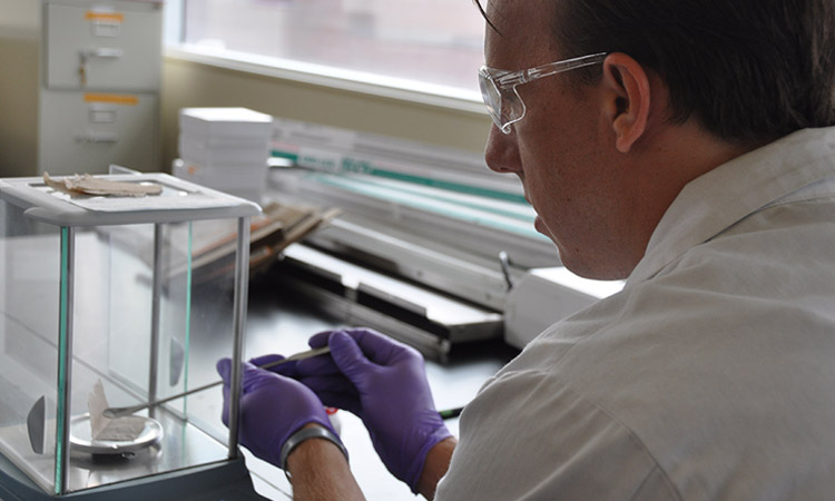 Chemistry graduate student doing research in lab